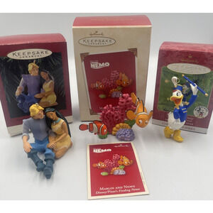 THREE‎ (3) HALLMARK DISNEY HOLIDAY ORNAMENTS DAISY Duck- NEMO- POCAHONTAS